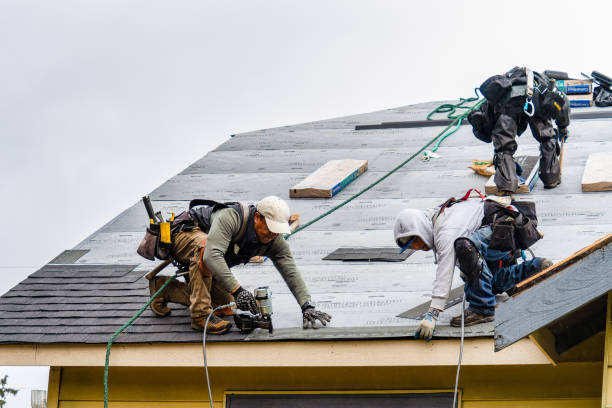 Professional Gutter Installation technician working in Malin, OR